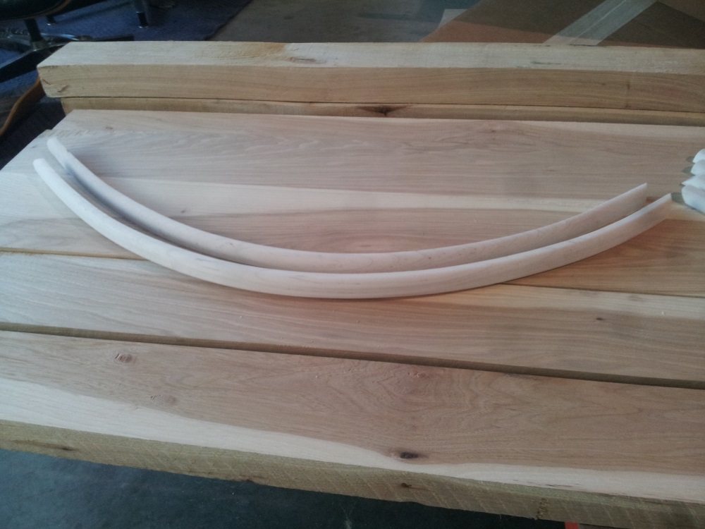 Custom curved shoe moulding for bottom stair.